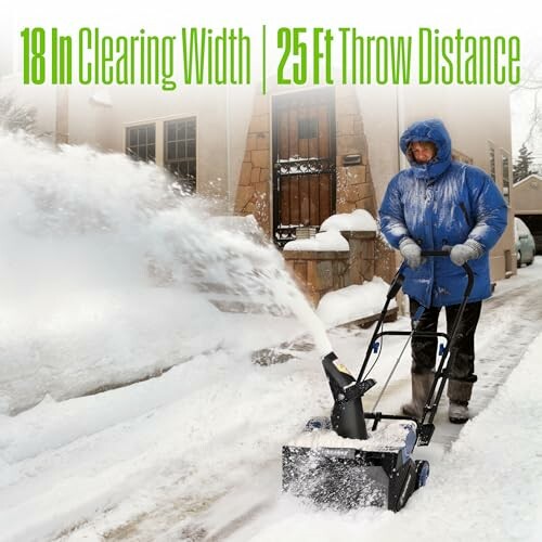 Person using a snow blower on a snowy path